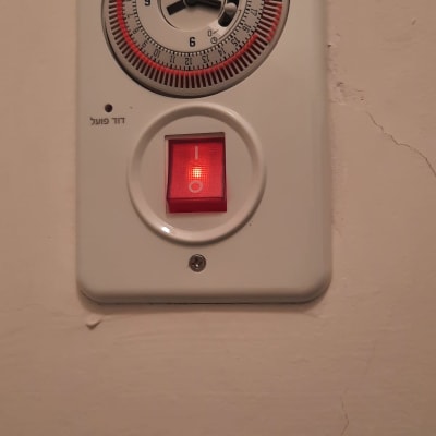 שעון טיימר עם מתג הפעלה מואר