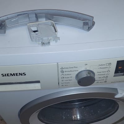 מכונת כביסה סימנס עם חלק פלסטיק מנותק