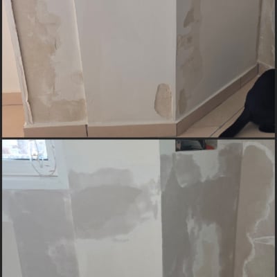 קירות עם תיקוני טיח וצבע