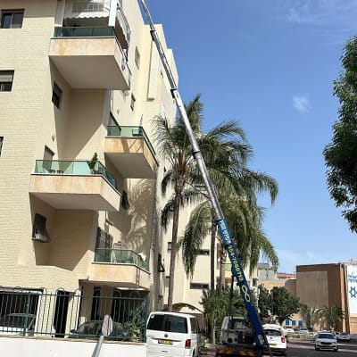 מנוף מרים פלטפורמה לגובה בניין