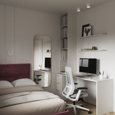 חדר שינה עם שולחן עבודה, כיסא ומחשב