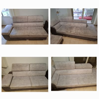 ספות אפורות בחדר מואר, ללא אנשים או טקסט.