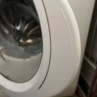 דלת מכונת כביסה עם חלון זכוכית עגול