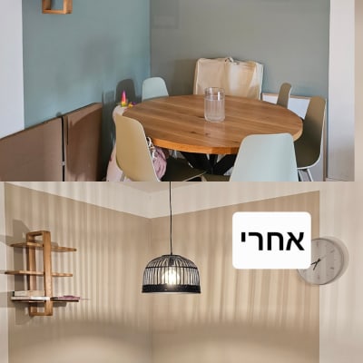 שולחן עגול עם כיסאות, מדף ספרים, מנורה ותמונה על הקיר