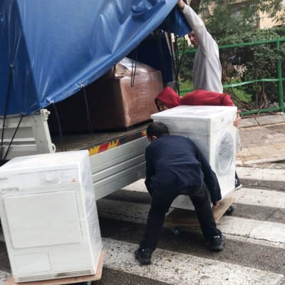 הובלת מכונת כביסה