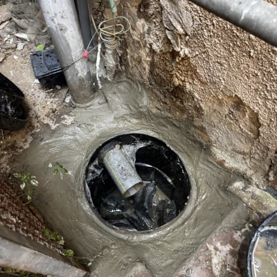 תמונה של צינור ביוב ותיקון בטון