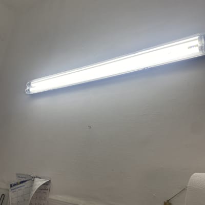 fluorescent light fixture on a wall