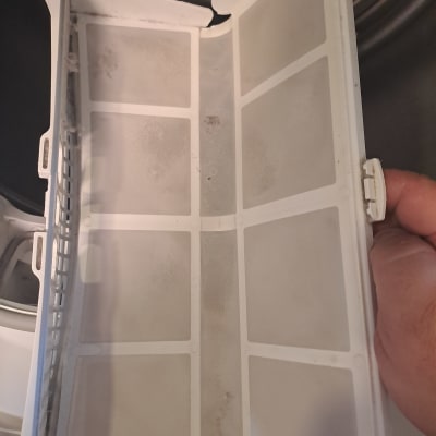 מסנן מייבש כביסה עם אבק ולכלוך קל