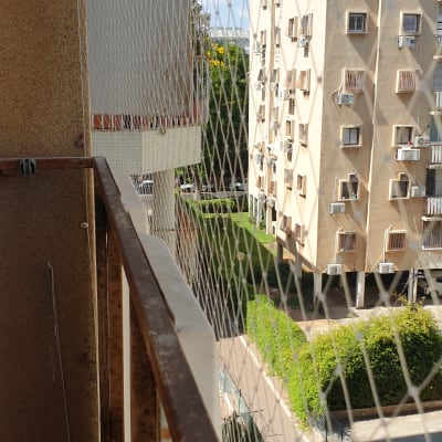 רשת הגנה על מרפסת למניעת כניסת יונים