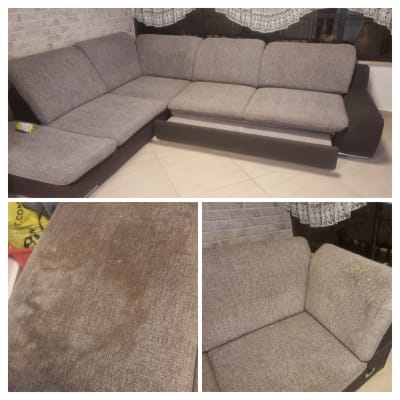 ספה אפורה עם כתמים, זקוקה לניקוי