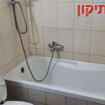 אחרי התיקון הנזילה והדבקת האריחים