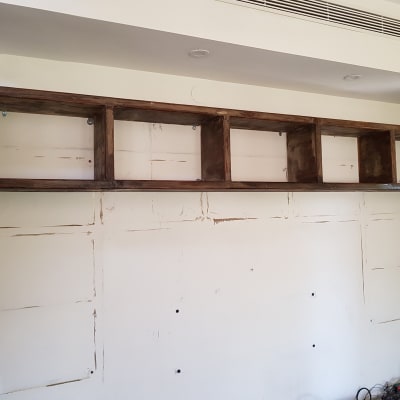 Wooden shelves installed on a wall