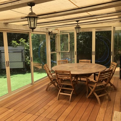 Sliding aluminium doors in a sunlit room