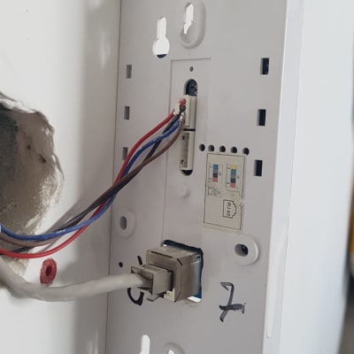 intercom wiring and mounting plate on wall