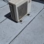 יחידת מיזוג אוויר על גג עם איטום