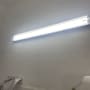 fluorescent light fixture on a wall