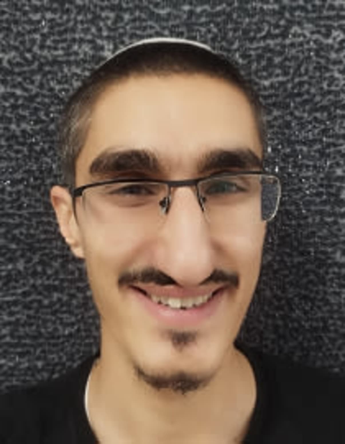 תמונת פורטרט של בעל המקצוע