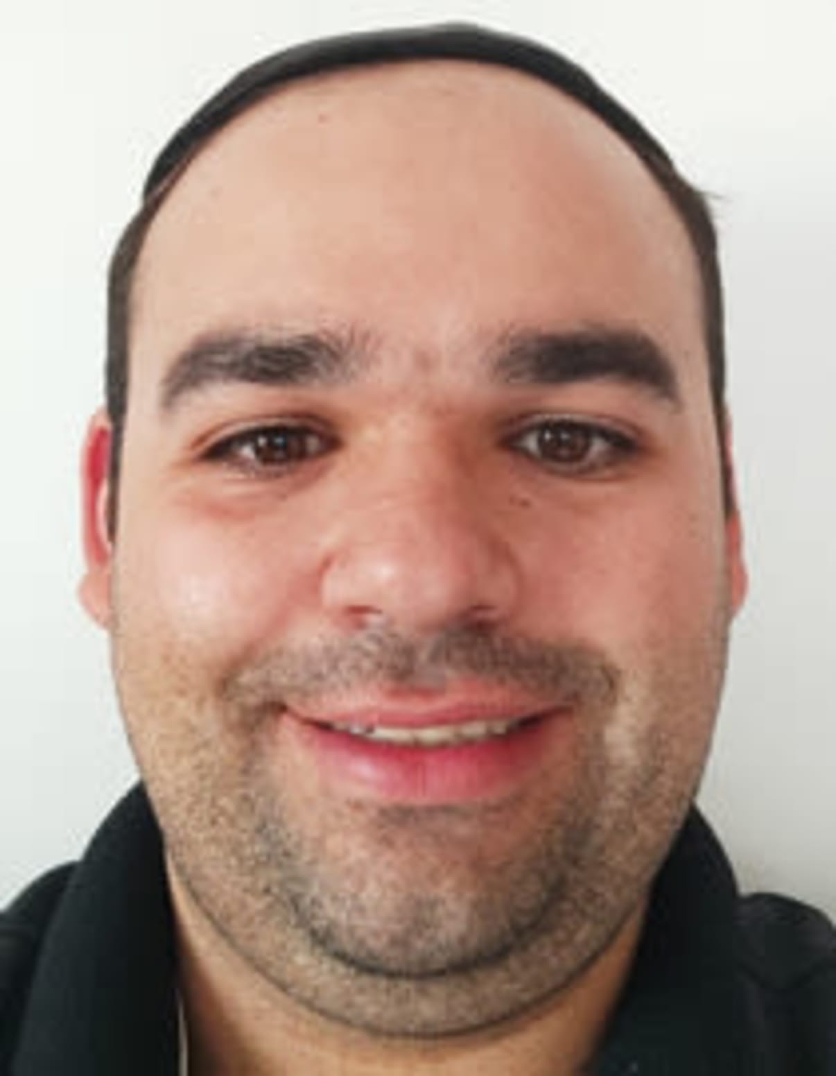 תמונת פורטרט של בעל המקצוע