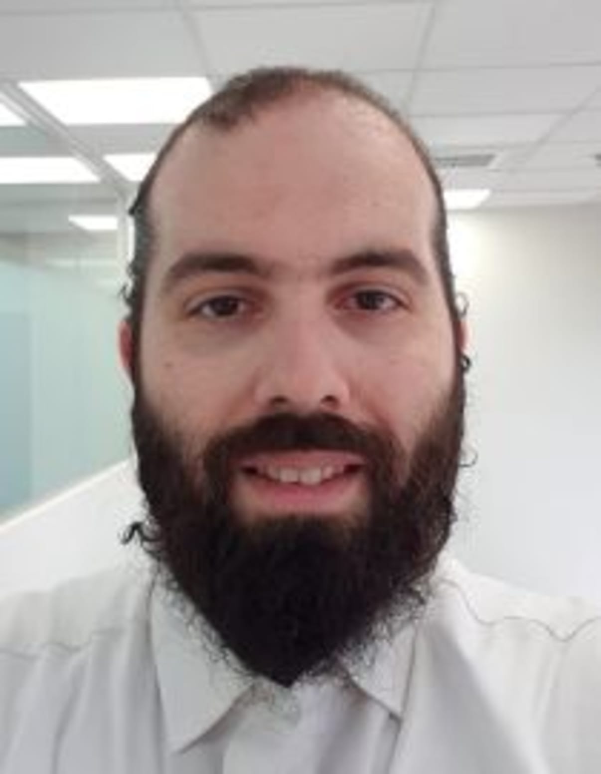 תמונת פורטרט של בעל המקצוע