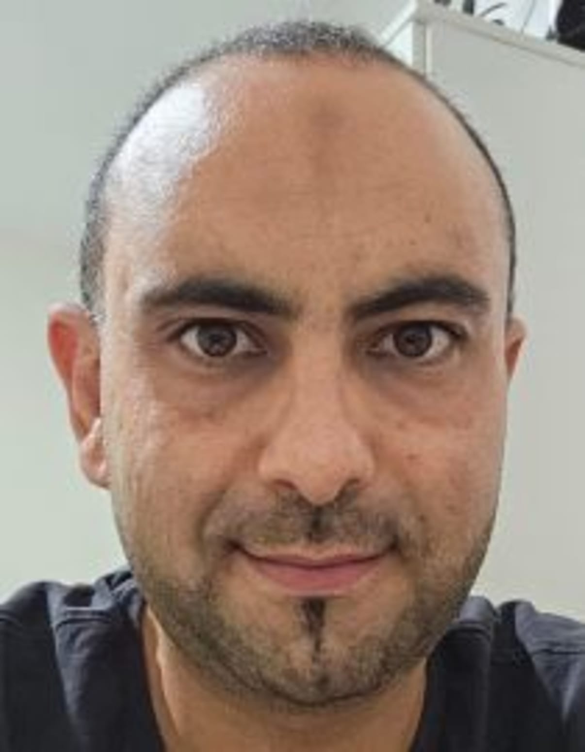 תמונת פורטרט של בעל המקצוע