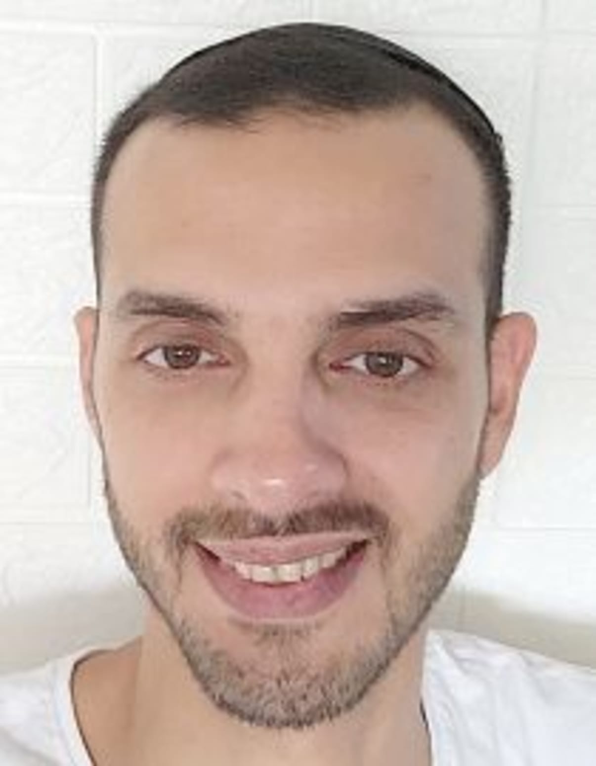 תמונת פורטרט של בעל המקצוע