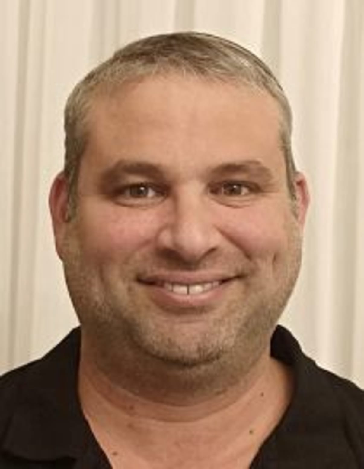 תמונת פורטרט של בעל המקצוע