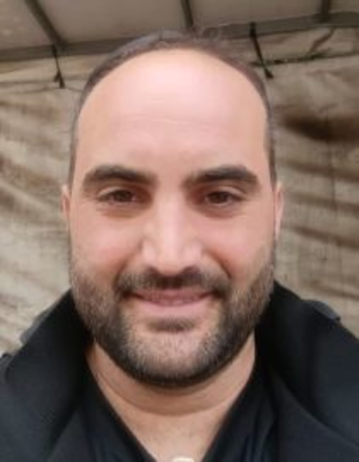 תמונת פורטרט של בעל המקצוע