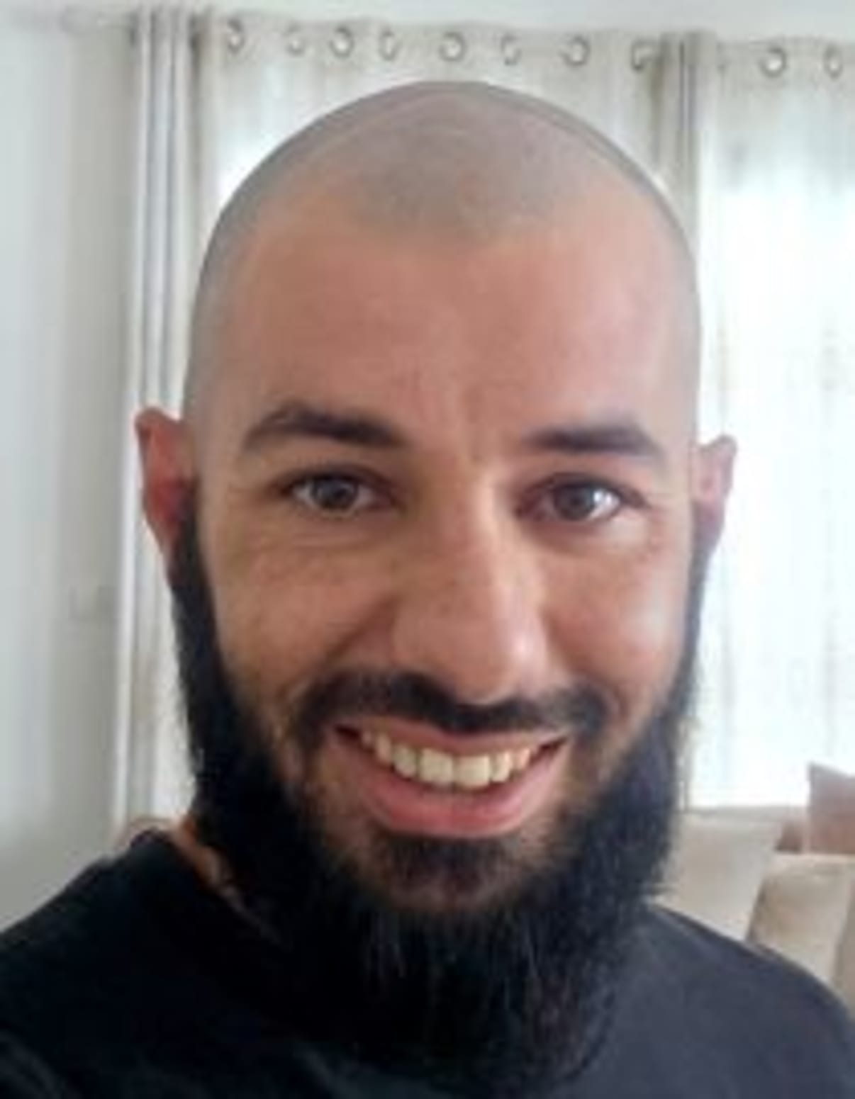 תמונת פורטרט של בעל המקצוע