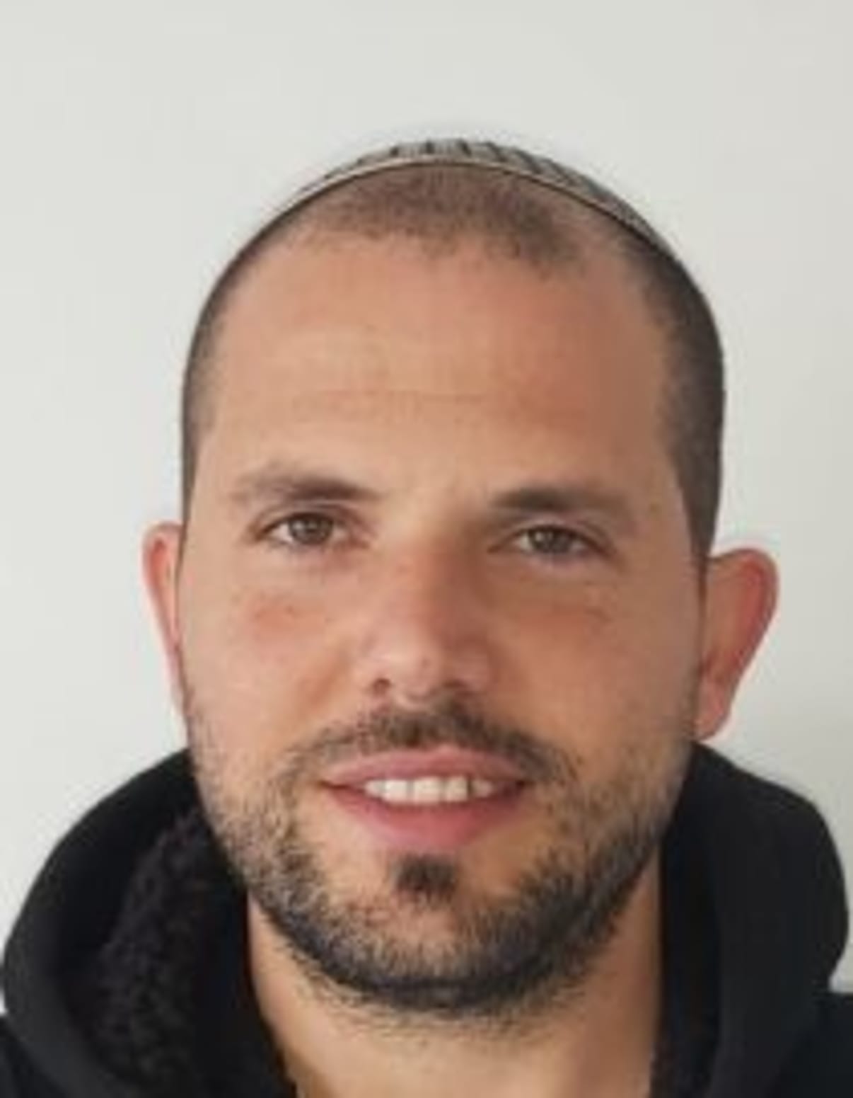 תמונת פורטרט של בעל המקצוע