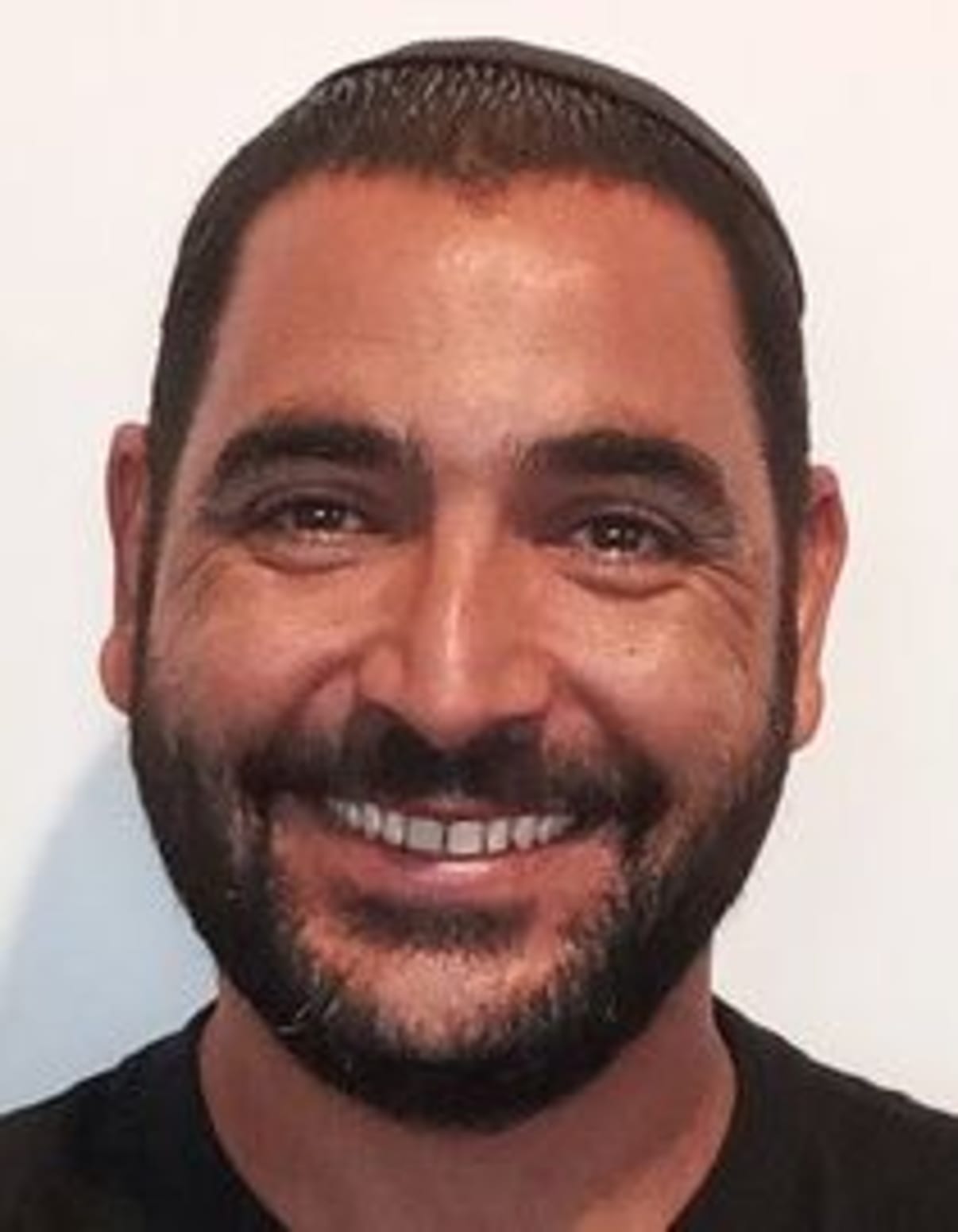 תמונת פורטרט של בעל המקצוע