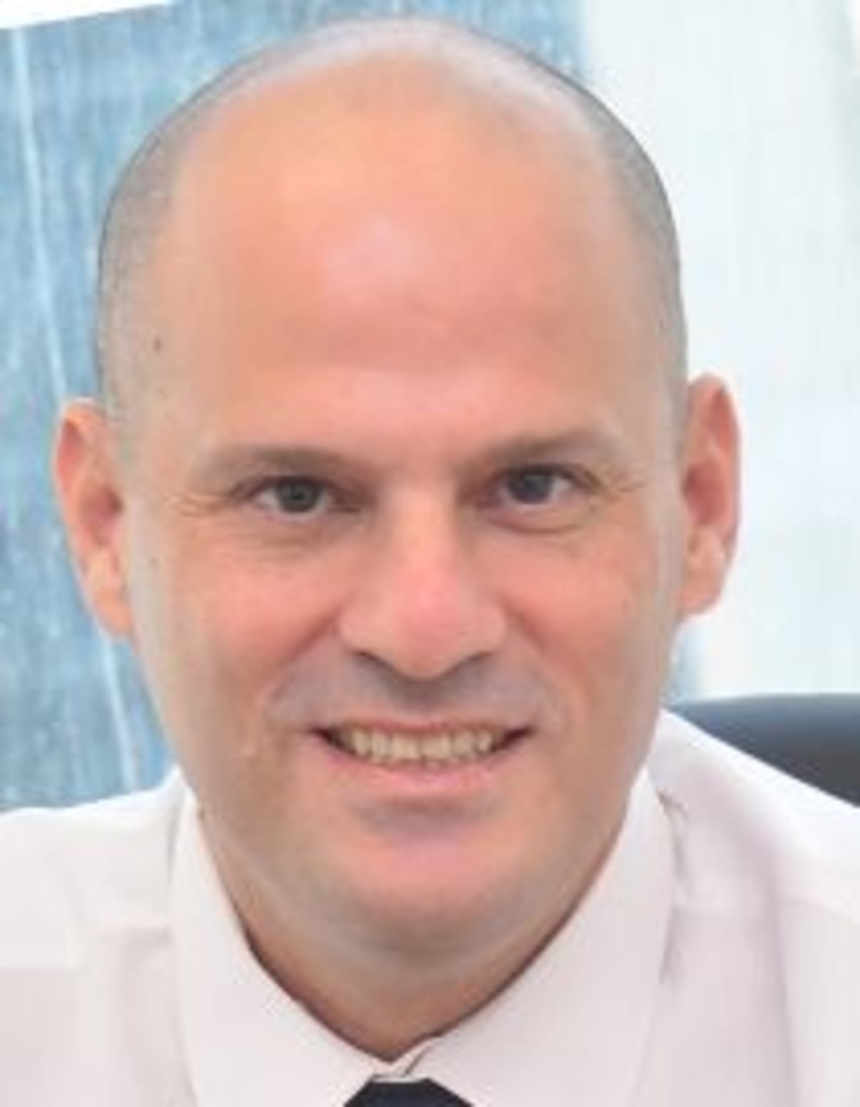 תמונת פורטרט של בעל המקצוע