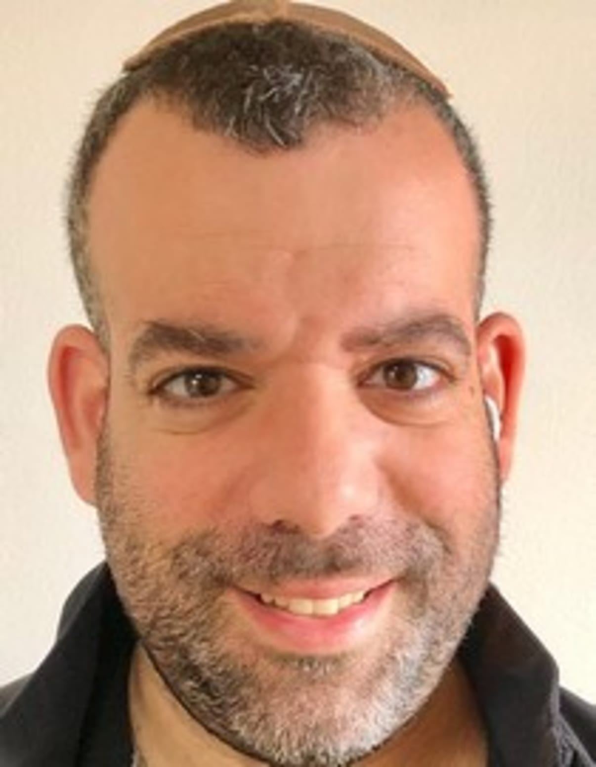 תמונת פורטרט של בעל המקצוע