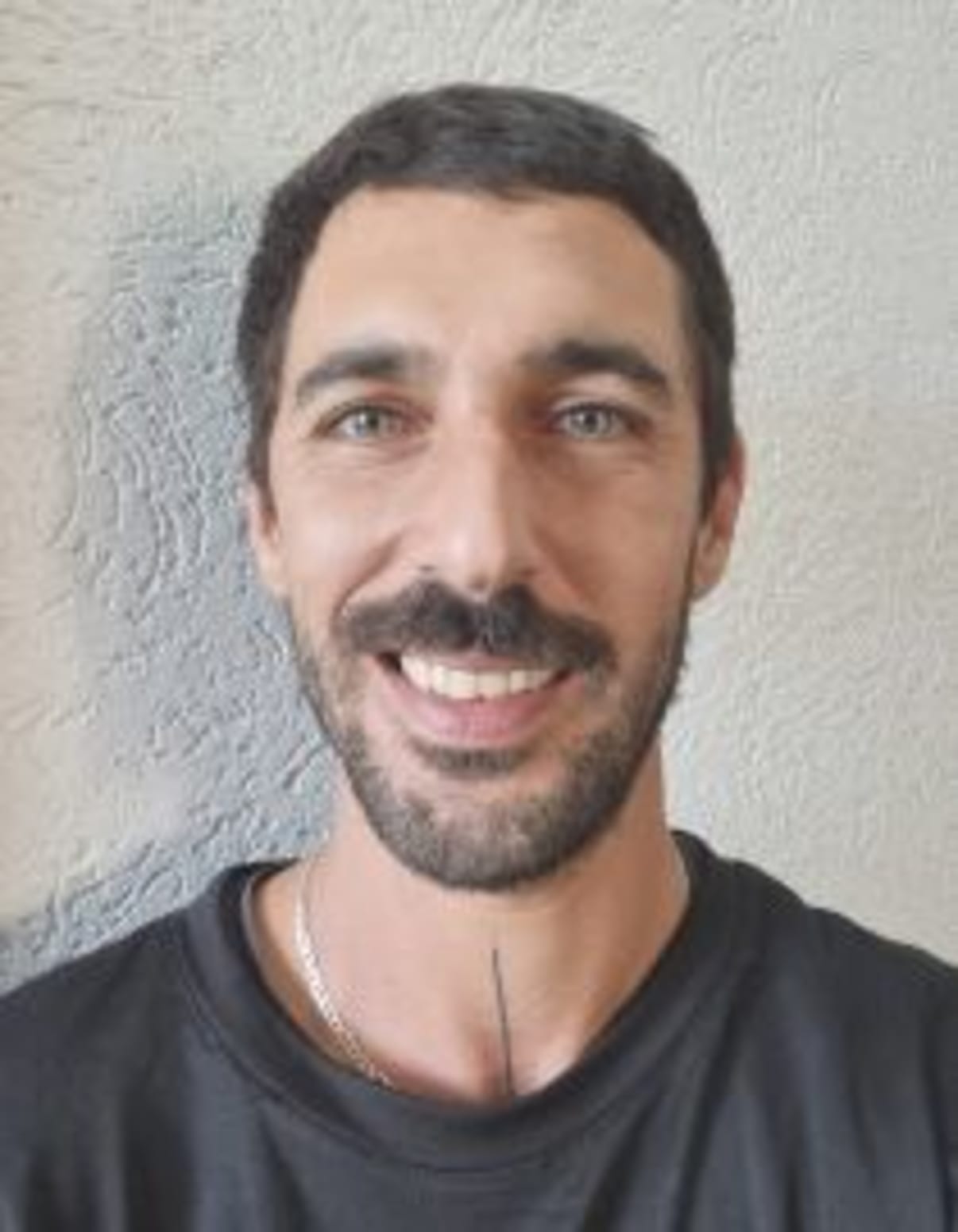 תמונת פורטרט של בעל המקצוע