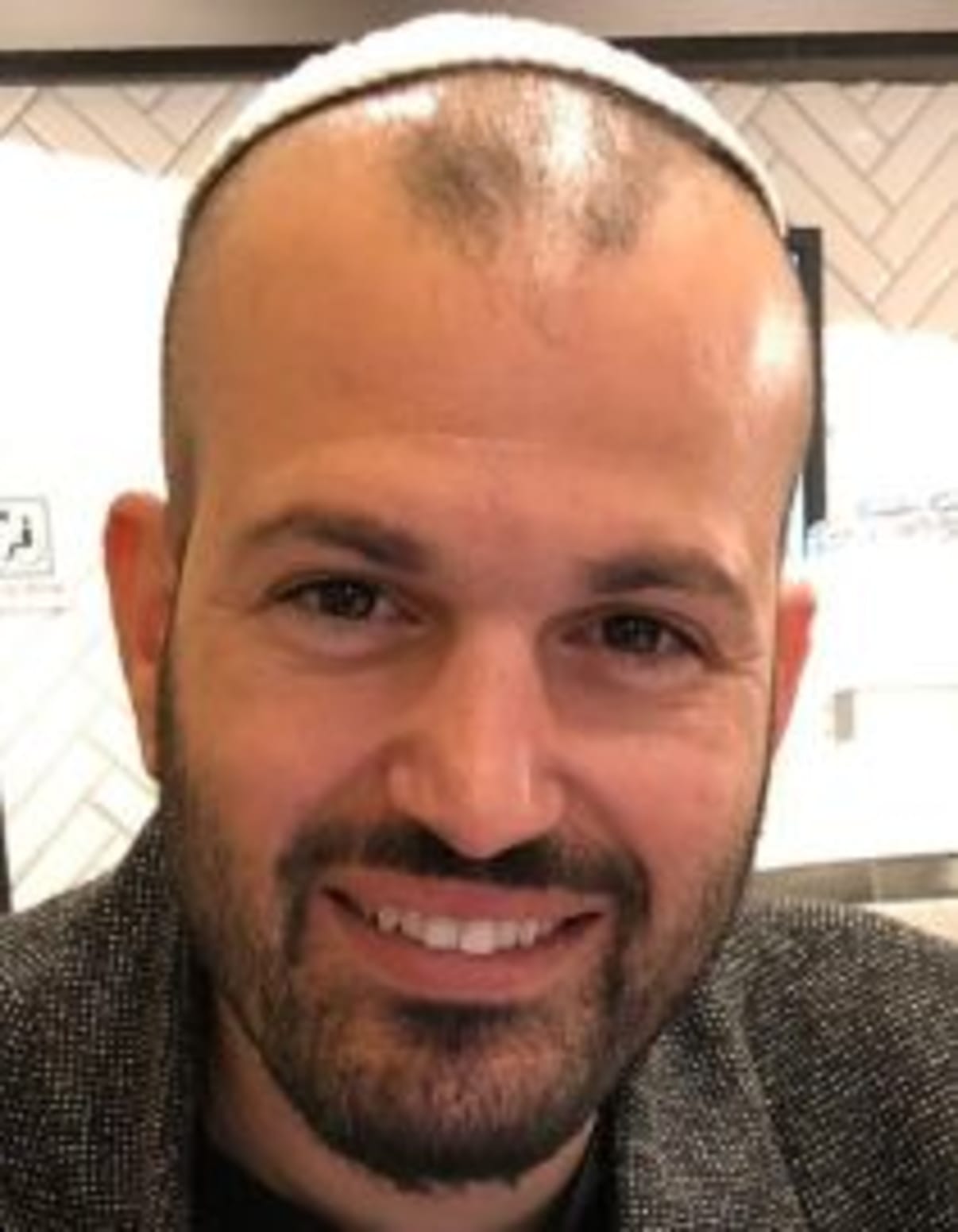 תמונת פורטרט של בעל המקצוע