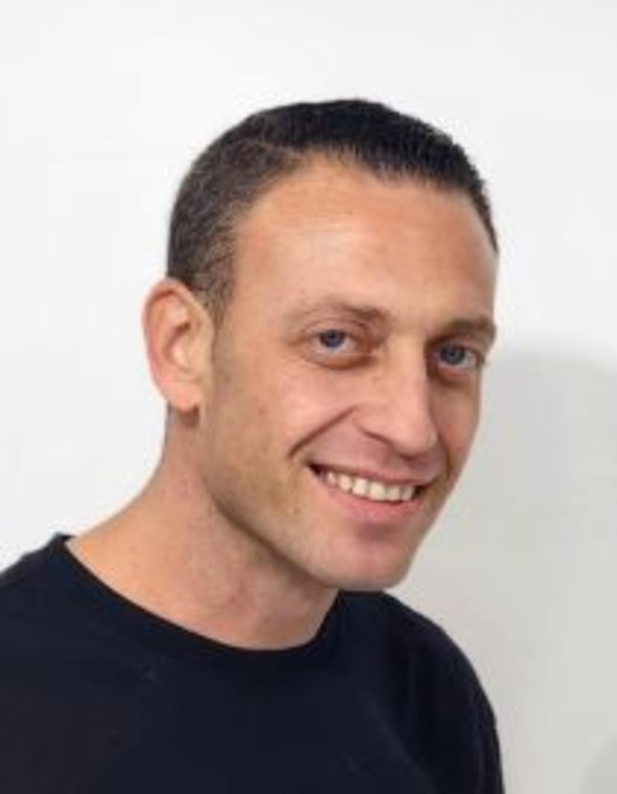 תמונת פורטרט של בעל המקצוע