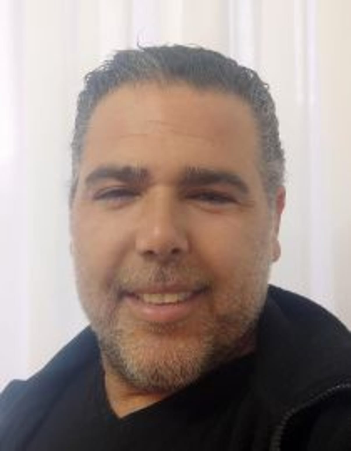 תמונת פורטרט של בעל המקצוע