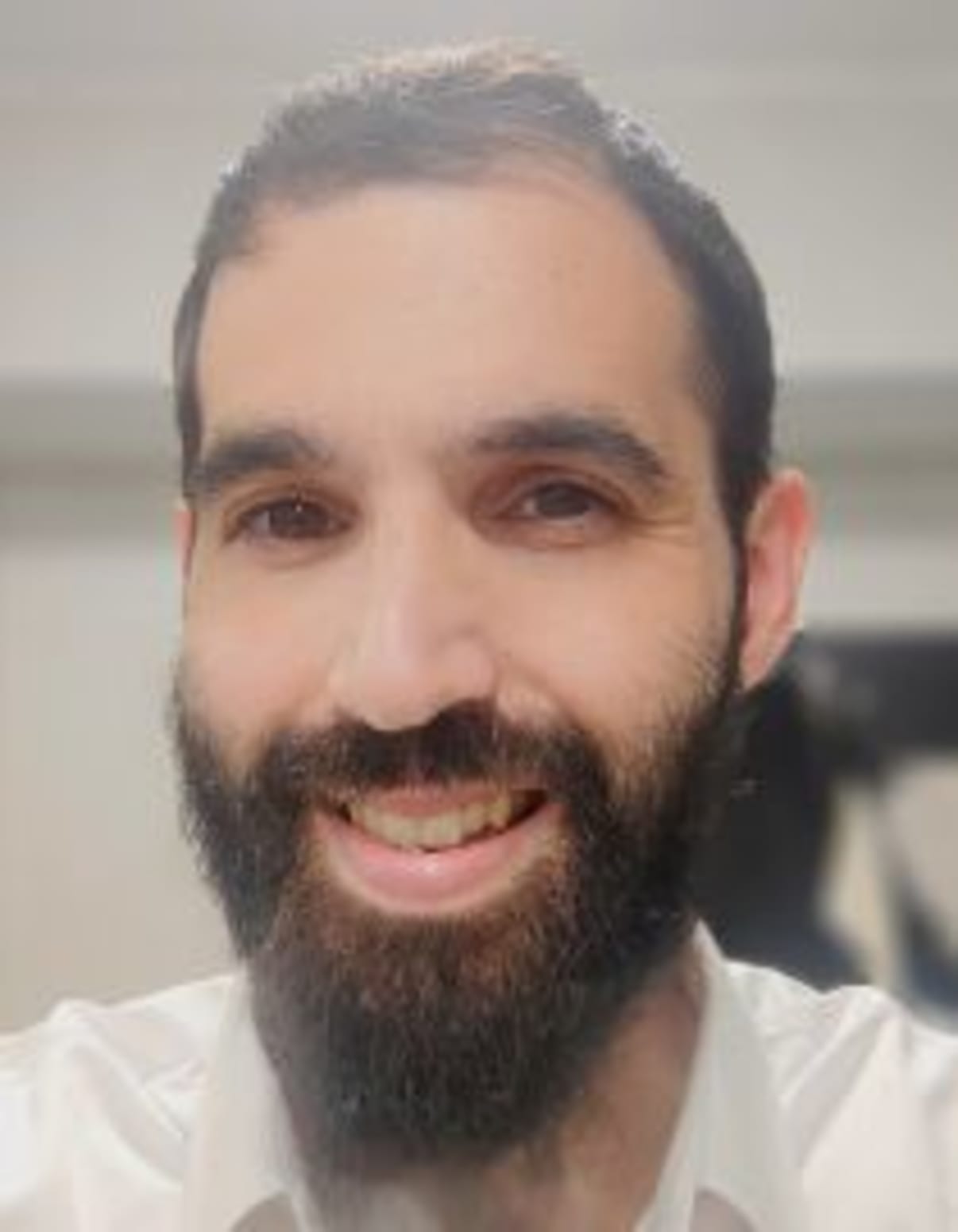 תמונת פורטרט של בעל המקצוע