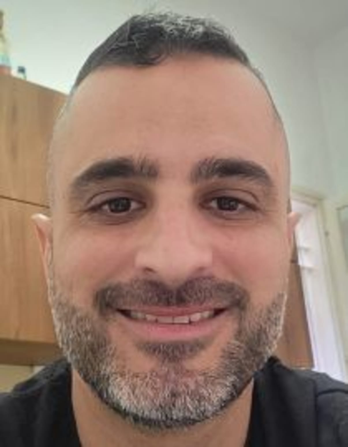 תמונת פורטרט של בעל המקצוע