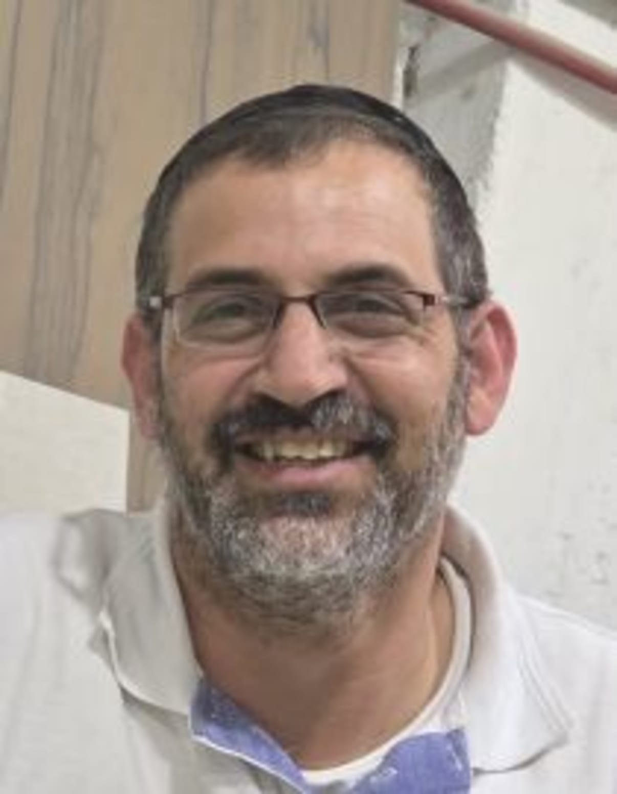 תמונת פורטרט של בעל המקצוע