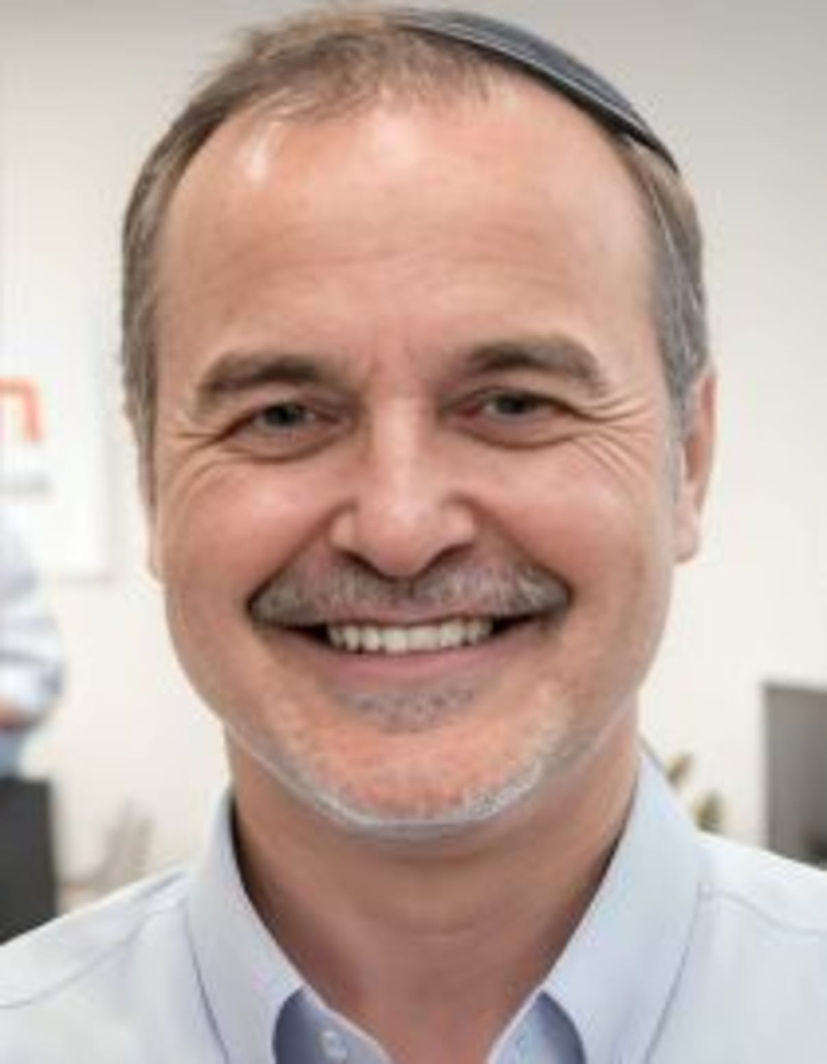 תמונת פורטרט של בעל המקצוע