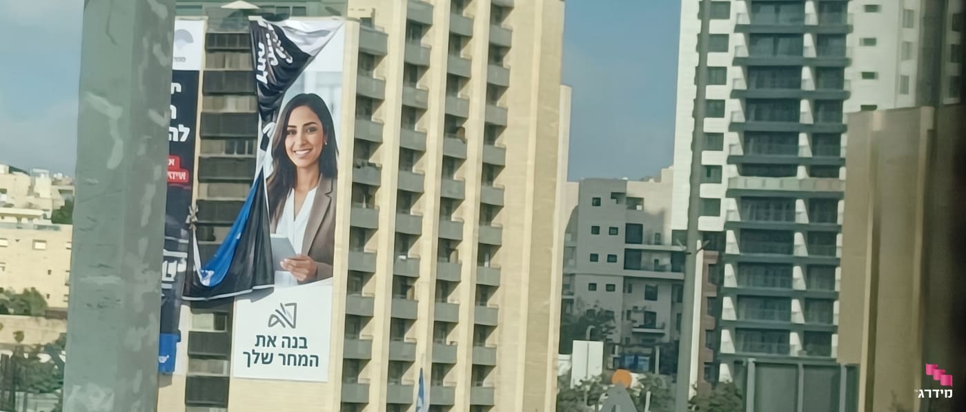 תליית שלטים בגובה תליית שלטים בגובה