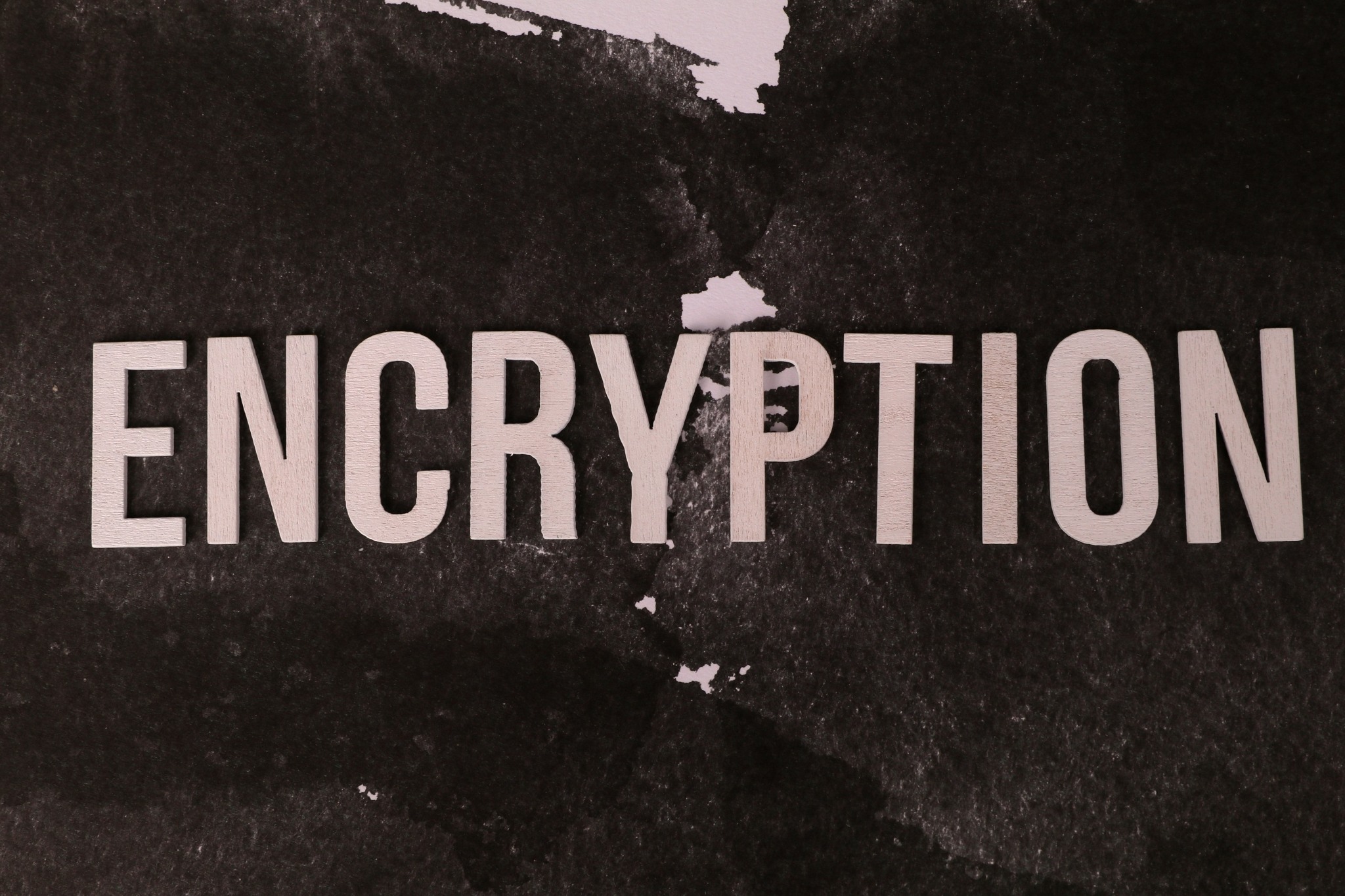 An abstract image with the word "ENCRYPTION"