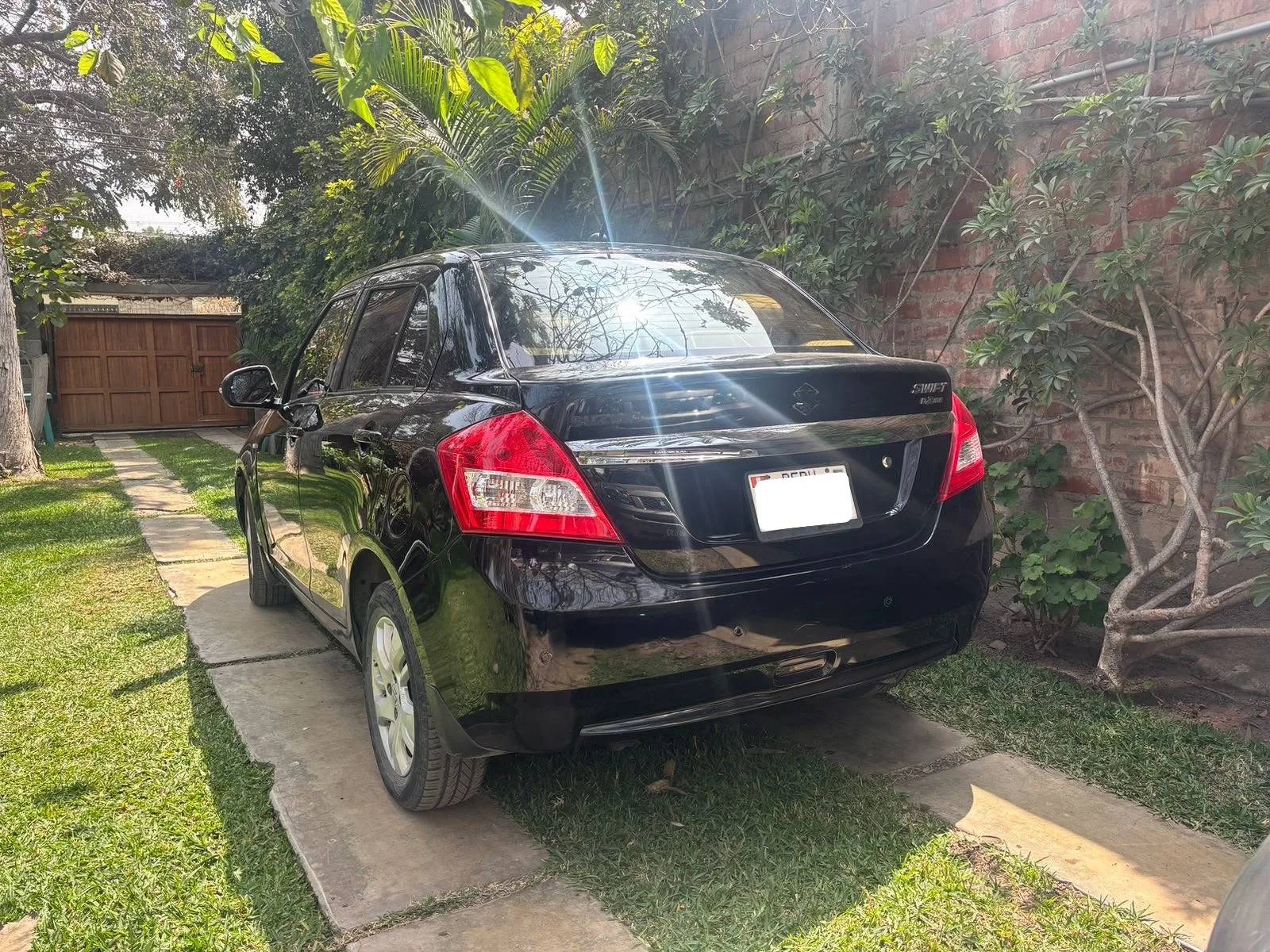 Suzuki Swift 2015 - rear-left photo 3