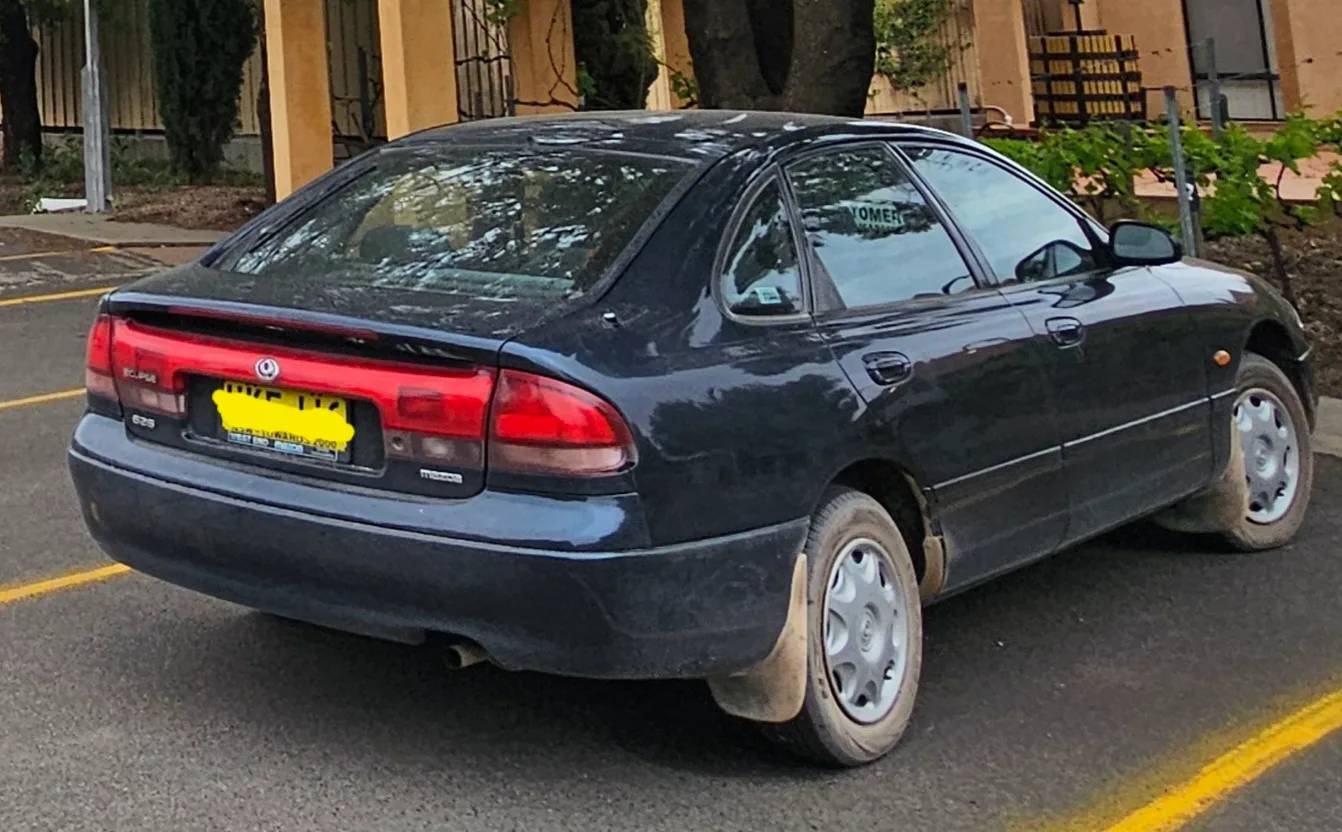 Mazda 626 1996 - rear-right photo 2