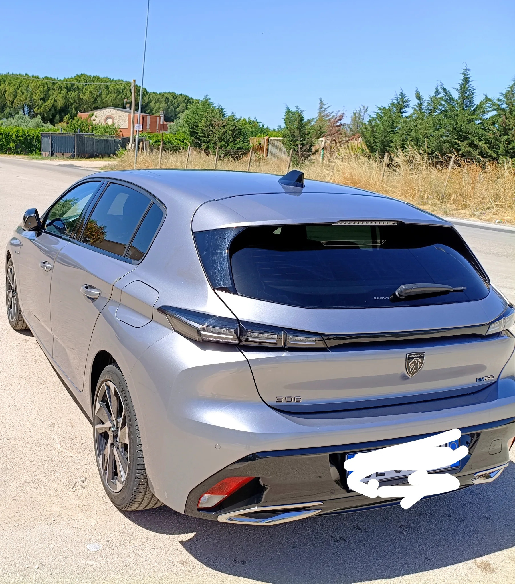 Peugeot 308 2022 - rear-left photo 3