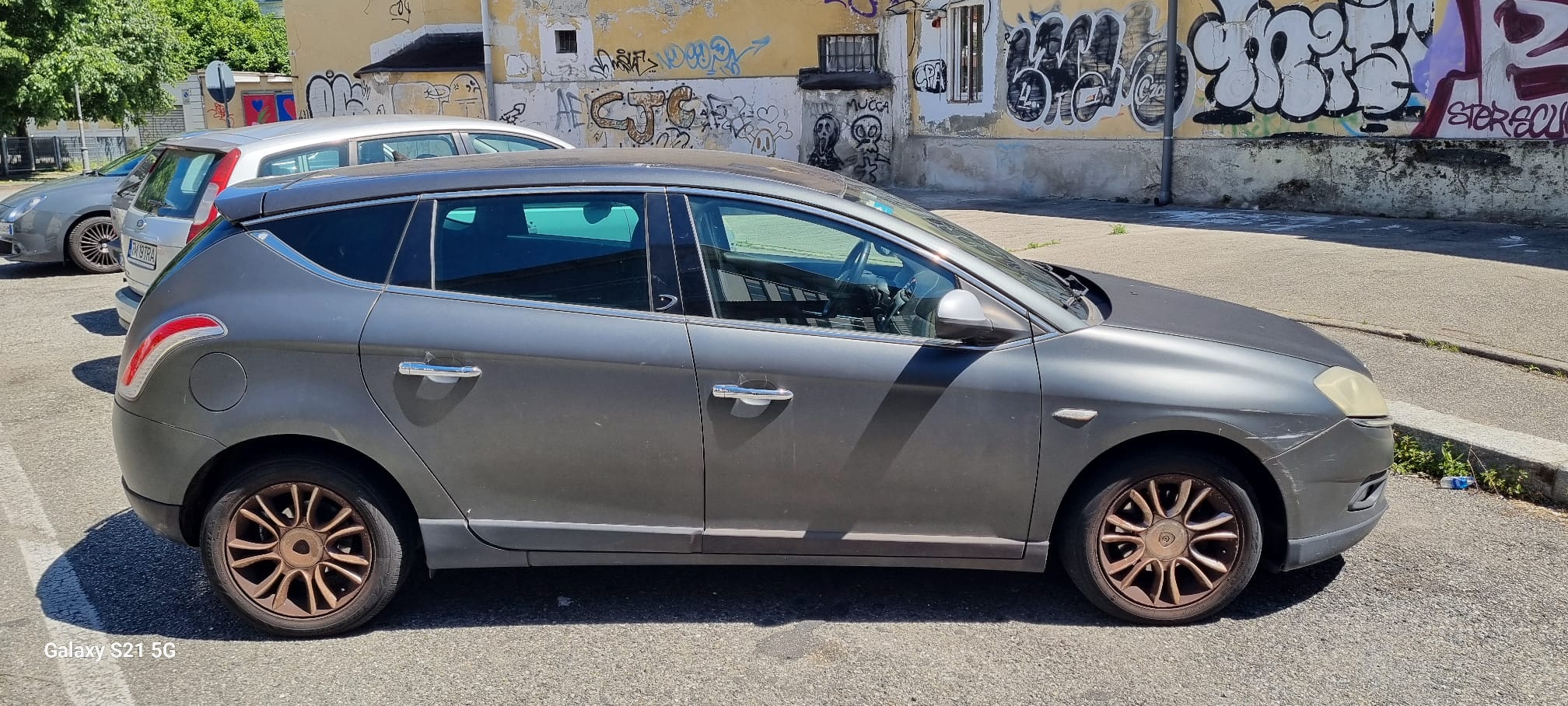 Lancia Delta 2011 - left-side photo 1
