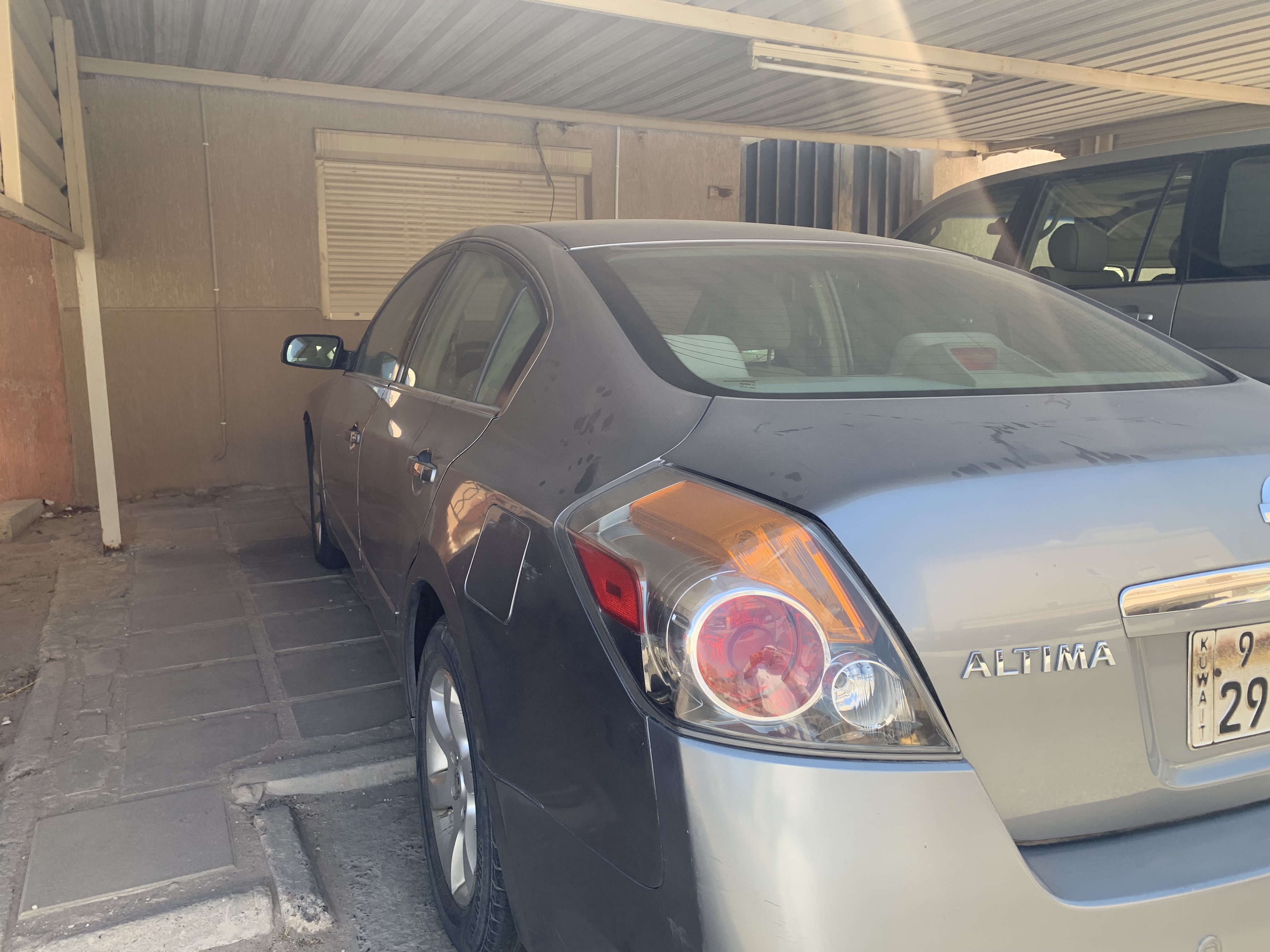 Nissan التيما 2009 - rear-right photo 4