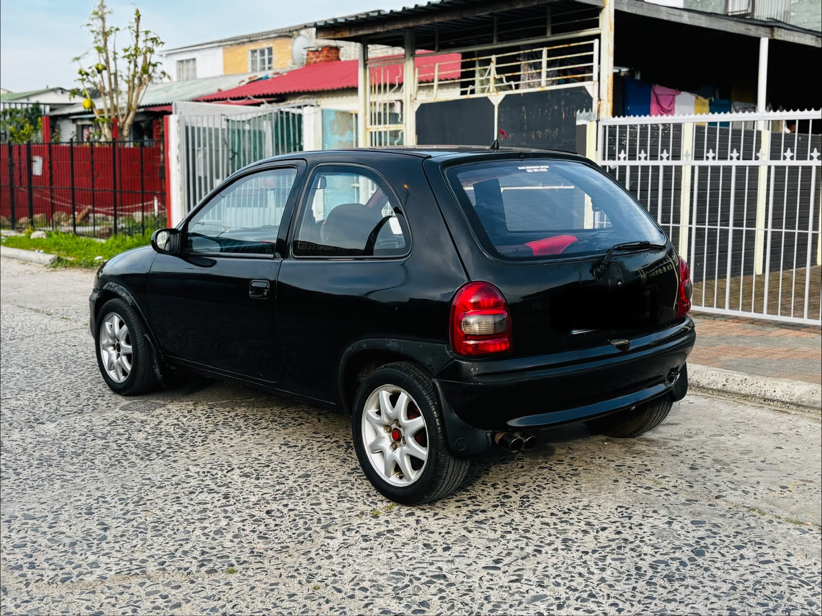 Opel Corsa 1998 - rear-left photo 3
