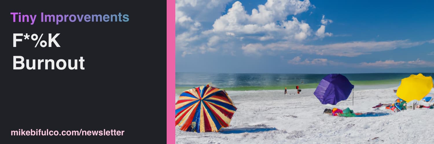 A serene, calming tropical beach scene. Several colorful umbrellas stuck in the sand, and puffy white clouds floating overhead