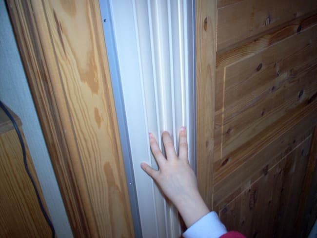 Fingerbeskytteren grå